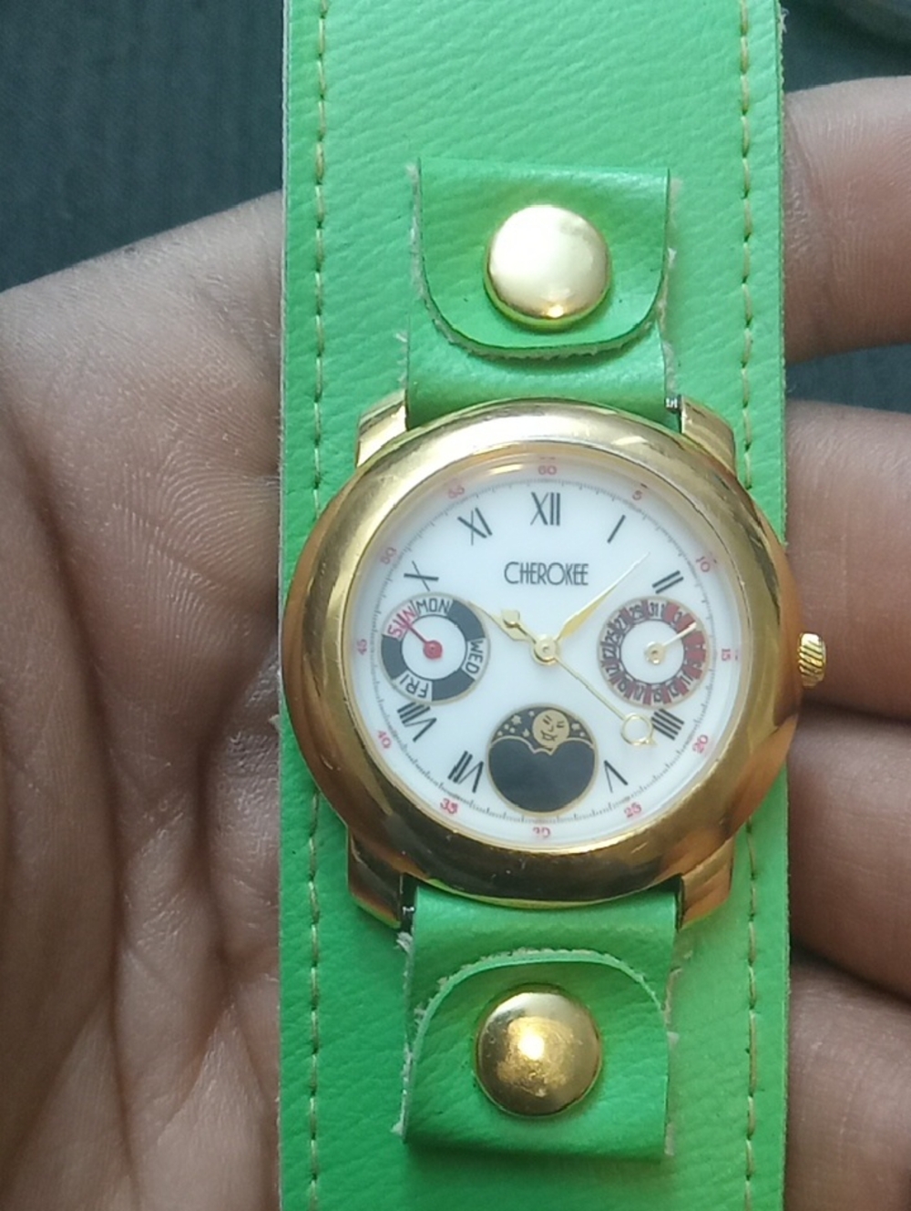 Cherokee Gold-Tone Watch with Green Leather Cuff